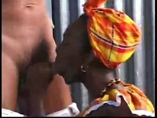 Horny black retro lady is sucking cock on her knees